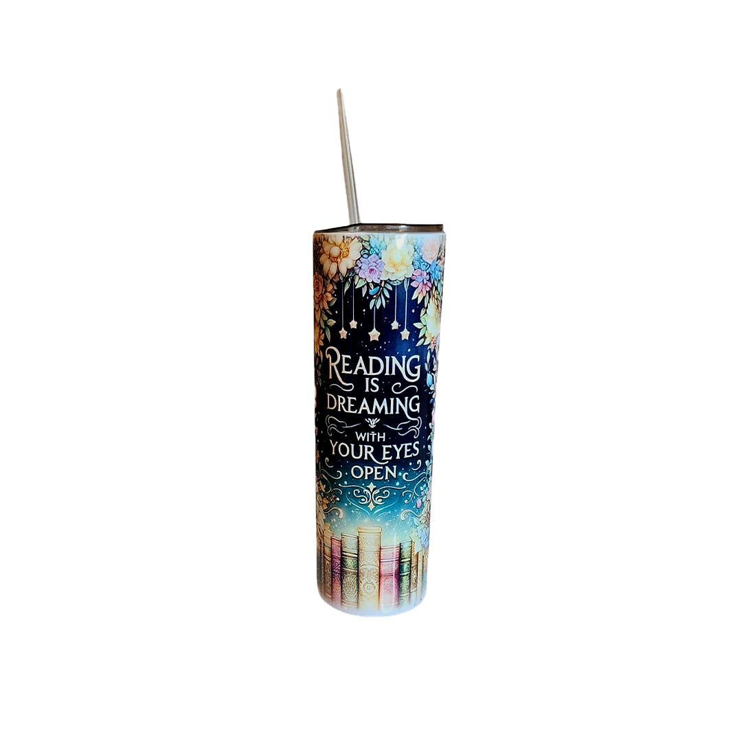 Stylish tumbler with colorful floral design and inspirational quote.